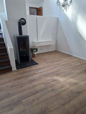 Wohnzimmer mit Kamin