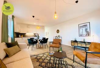 Wohnbereich mit offener Küche Beispiel