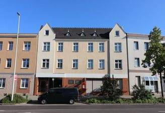 Bild 1 Wohn- und Geschäftshaus