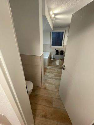 Bad mit bodenebener Dusche