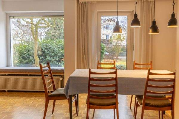 Familienidyll in Bogenhausen: Doppelhaushälfte mit sonnigem Westgarten & Grünblick