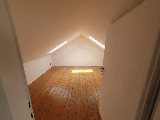 Zimmer im Spitzboden