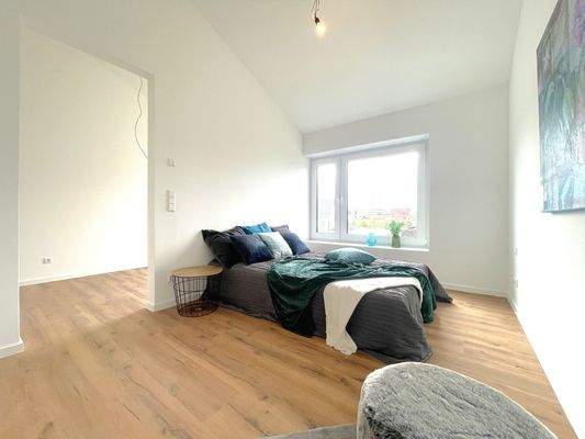 Schlafzimmer mit begehbarem Schrank