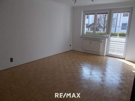 Wohnzimmer mit Zugang zur Loggia