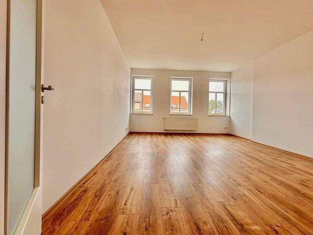 Sanierte 4-Raum-Maisonettewohnung mit Dachterrasse - Photo 1