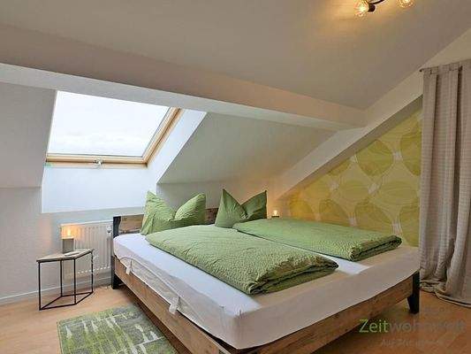 Doppelbett im Schlafzimmer