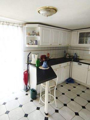 Haus OG Blick Küche mit Wintergartenzugang