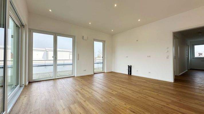 Wohn-/Esszimmer mit Kochbereich