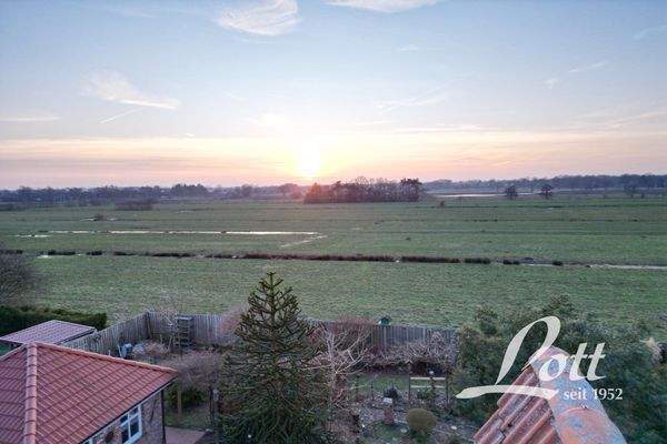 Ausblick auf Wiesen und Felder