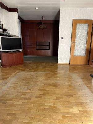 Wohnzimmer mit Essplatz/Zugang Terrasse