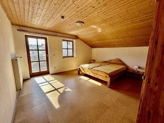 Schlafzimmer im DG mit Balkon