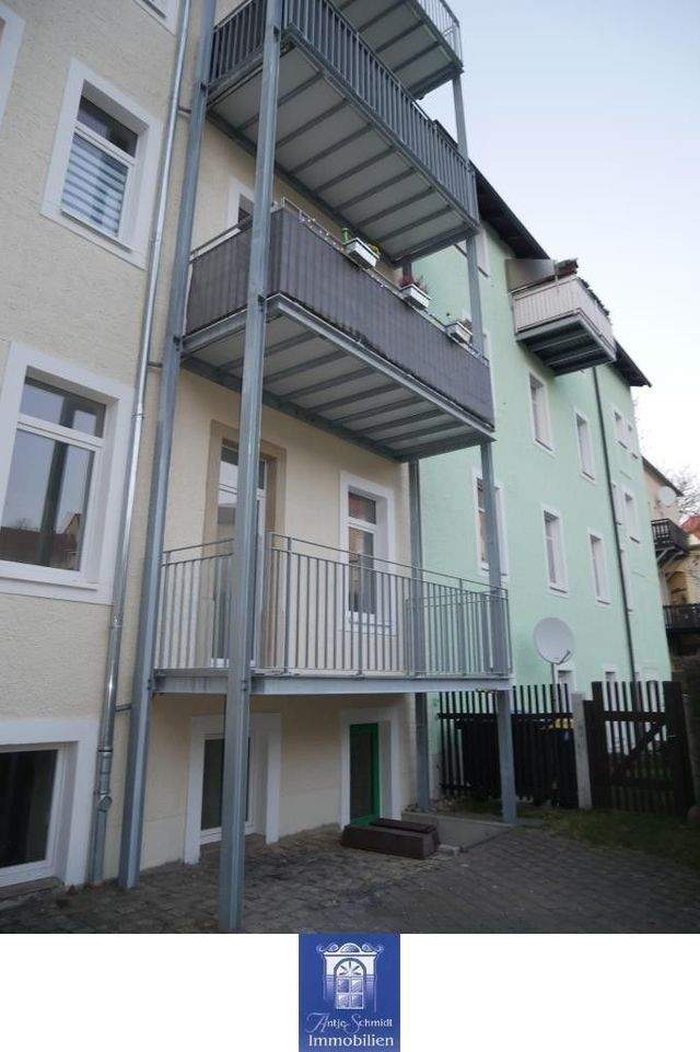 Ihre perfekte Familienwohnung mit Balkon und Blick ins Grüne in sehr schöner Lage! - Foto 4