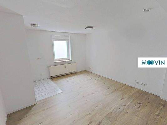 Ansicht II: Wohn - und Essbereich mit offener Küchennische