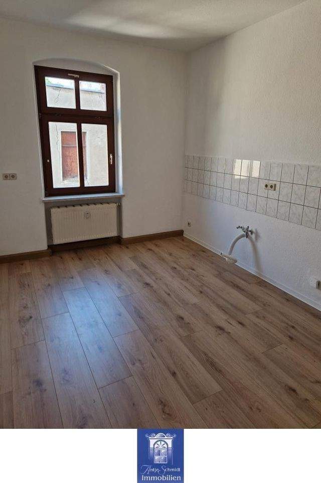 Zentral gelegene Wohnung mit Tageslichtbad und Wohnküche! - Foto 2