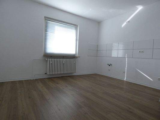 Beispielfoto Wohnzimmer mit Küchenzeile