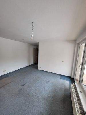 Wohnzimmer mit Balkon