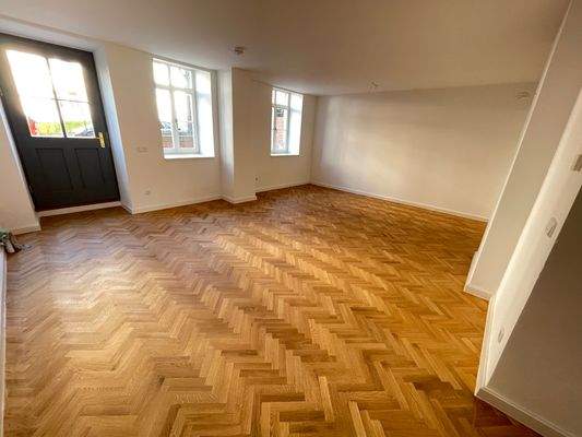 Wohnzimmer Parkett Fußbodenheizung.JPG