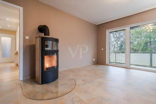 Wohnzimmer mit Kaminofen für gemütliche Stunden