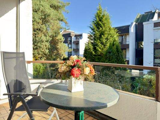 Süd-Ost-Loggia mit Gartenblick