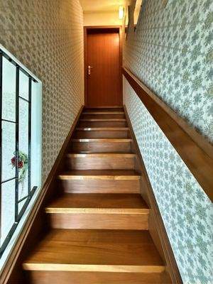 Treppenaufgang zum nicht ausgebauten Dachgeschoss