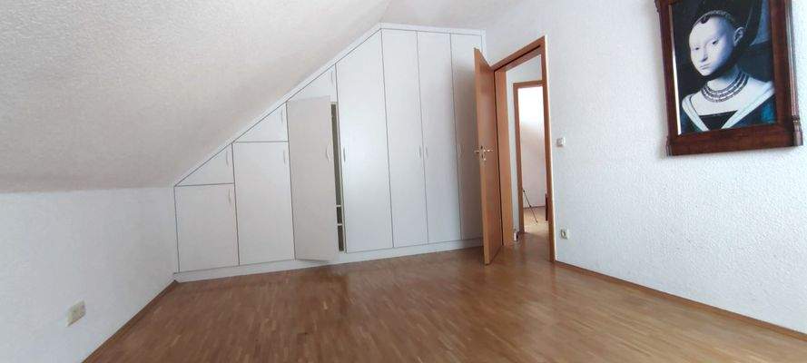 Schlafzimmer mit Einbauschrank