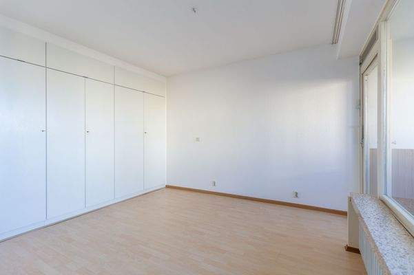 Schlafzimmer mit Balkonzugang