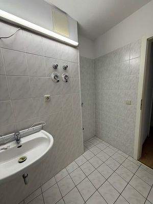 Bad mit Nische für Waschmaschine