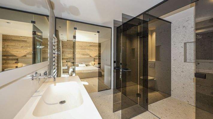 KITZIMMO-Luxuriöse Gartenwohnung mit eigenem Wellnessbereich - Immobilien Brixen.