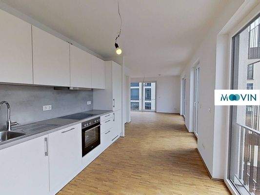 Ansicht IV: Wohn- und Esszimmer mit offenem Küchenbereich