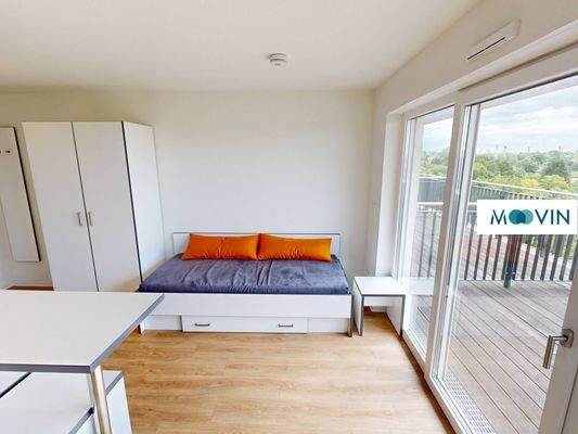 Ansicht II: Wohn- und Schlafzimmer mit offenem Küchenbereich