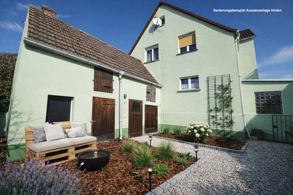 Hausansicht von hinten Sanierungsbeispiel Aussenanlage hinten.png