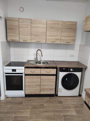 Küchenzeile mit WM und Herd