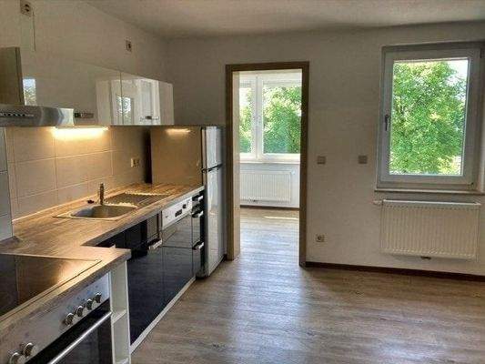 Küche im Dachgeschoss mit Zugang zum Wintergarten