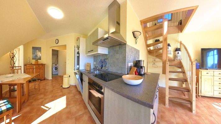 Offene Einbauküche im offenen Wohnkonzept