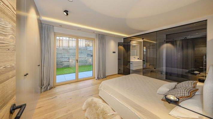 KITZIMMO-Luxuriöse Gartenwohnung mit eigenem Wellnessbereich - Immobilien Brixen.