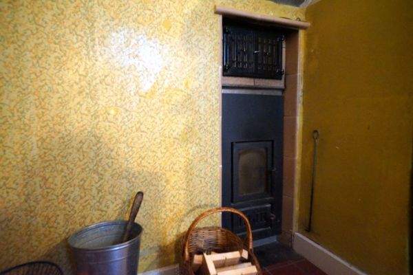 Befeuerung Kachelofen-Küche