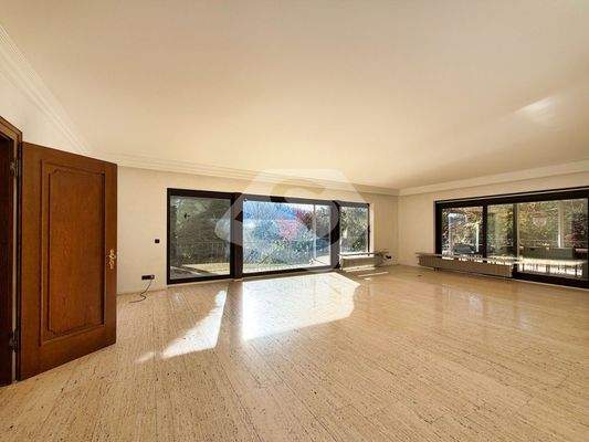 Wohnzimmer mit zugang zur Terasse