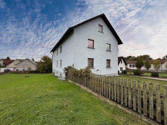 Wohnhaus und Grundstück