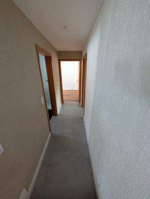 1.OG Flur in Zimmer
