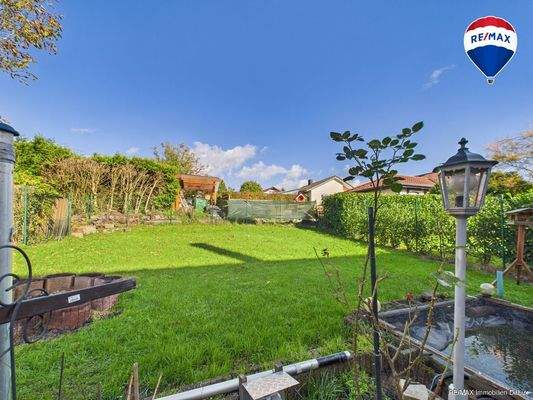 RE/MAX Immobilien DeLux Einfamilienhaus Niederlosheim Garten