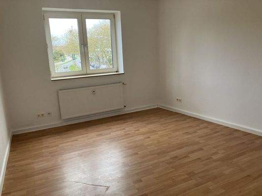 Wohnzimmer mit Balkon