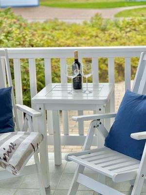 Entspannen auf der offenen Veranda vor dem Haus