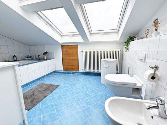 Schlafzimmer mit einem Badezimmer