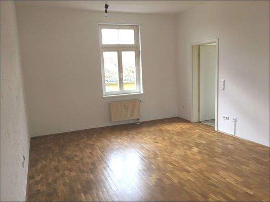 Wohn-/Essbereich mit Küchenzugang