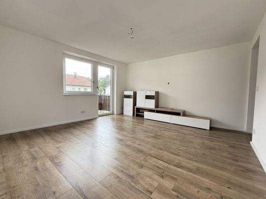 Wohnzimmer mit Balkon