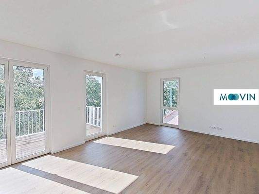 Ansicht I: Wohn- und Esszimmer mit offenem Küchenbereich