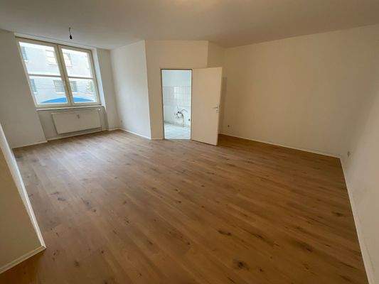 Wohnzimmer mit Küche