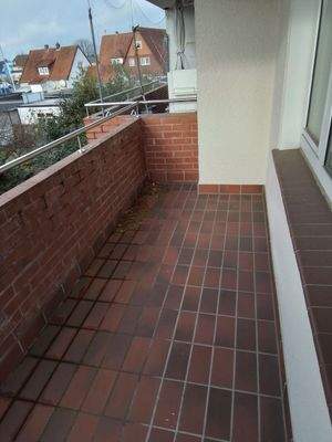 Balkon mit Ziegelboden