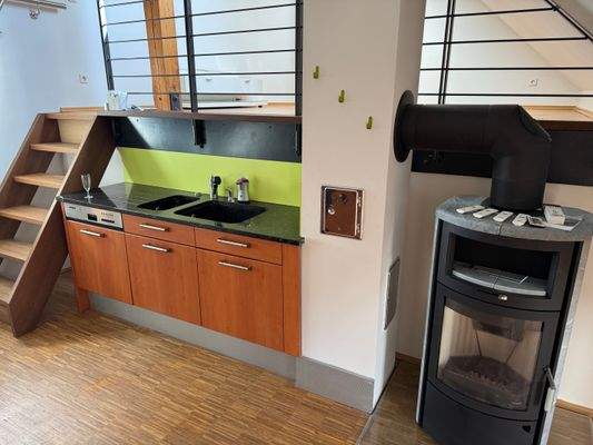 Küche mit Kaminofen