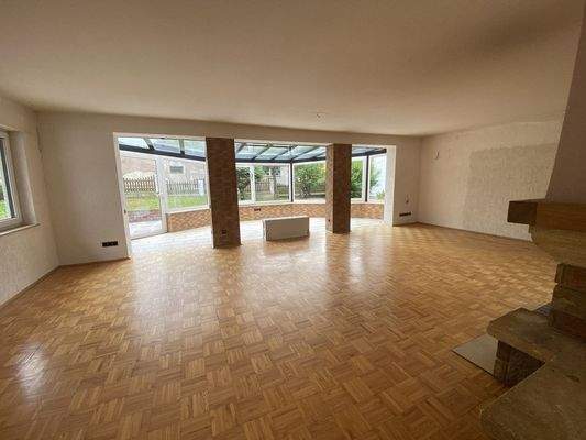 Wohnzimmer mit Wintergarten